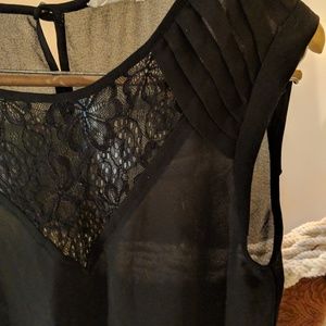 Sheer black sleeveless blouse